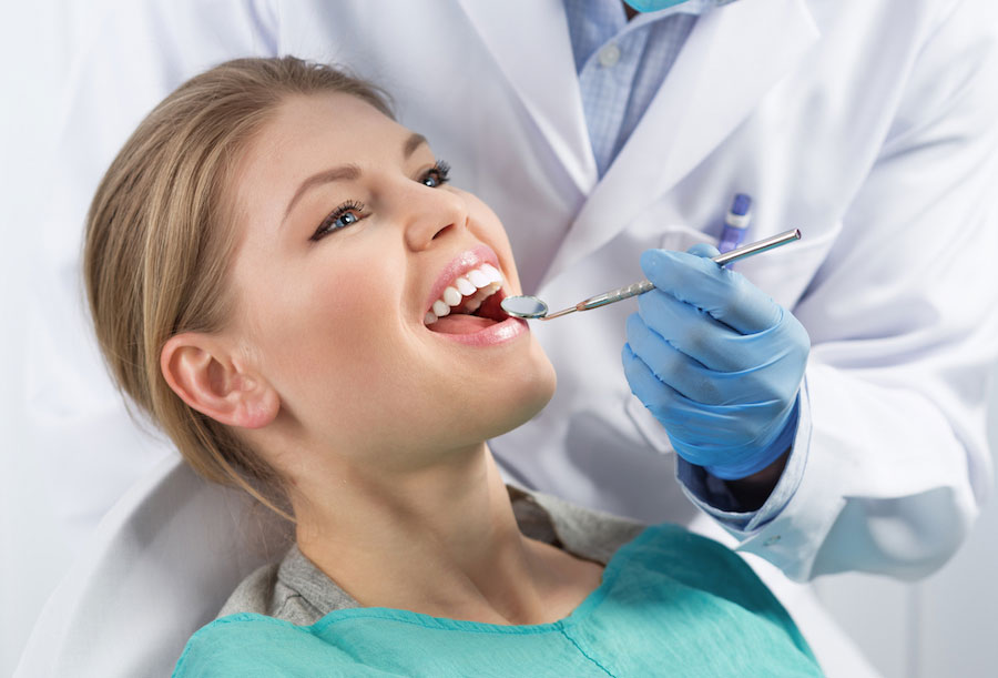 Dental specialist consulting with patient